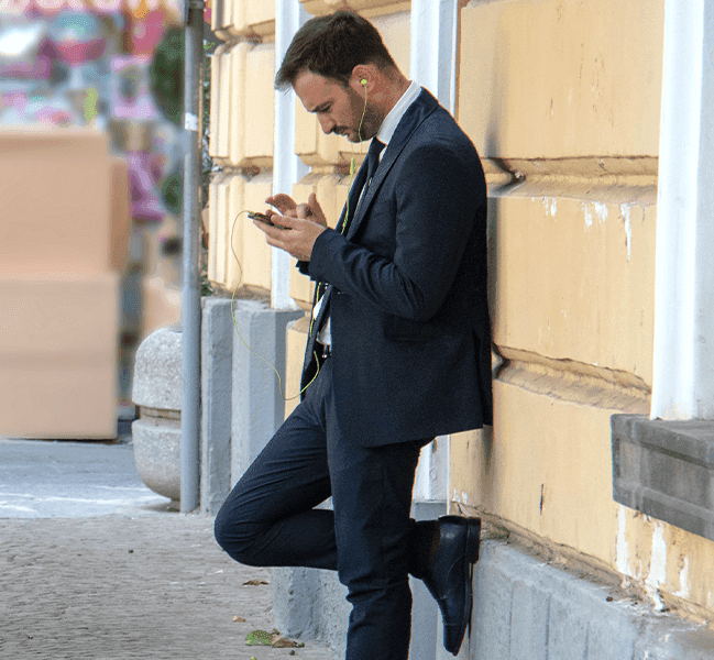 Businessman texting