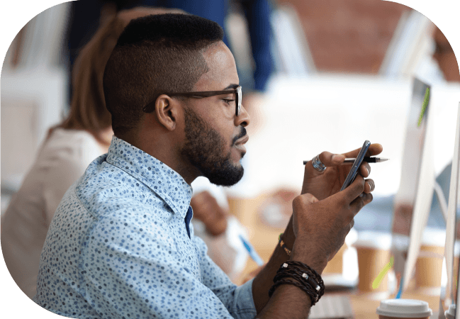 Businessman uses SMS opt in on his mobile device